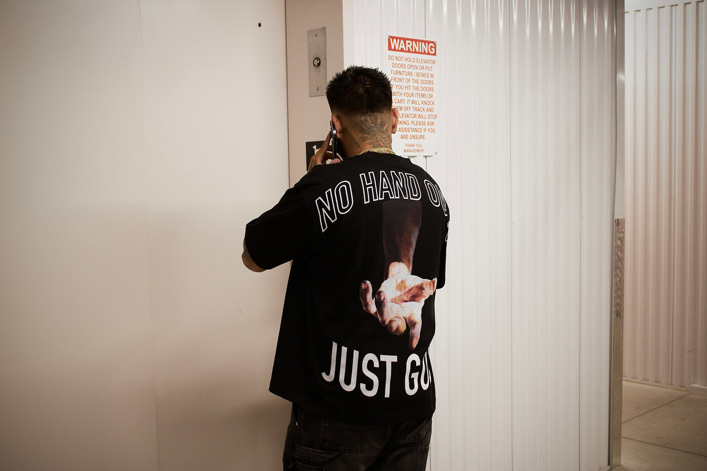 “NO HAND OUTS” Black Tee